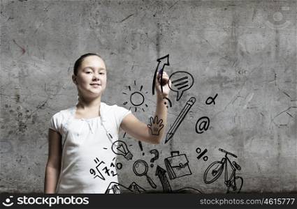 Cute school girl. School pretty girl drawing sketches with marker