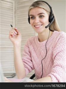 cute smiley student wearing headphones e learning concept
