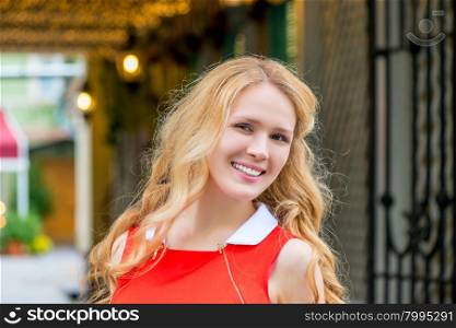 cute smiling girl posing in urban locations
