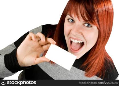 Cute smiling redhead girl holding a blank business or visiting card.