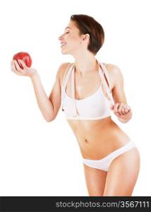 cute sporty woman with apple on white background