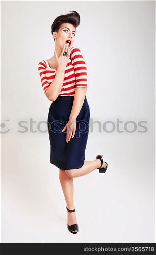 cute surprised woman in t-shirt and skirt
