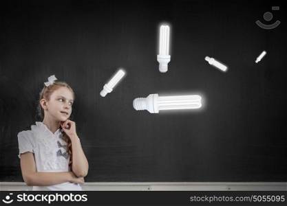 Cute thoughtful school girl and light bulb above her head. Let me think