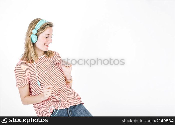 cute woman dancing with closed eyes