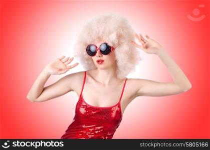 Cute woman in afro wig