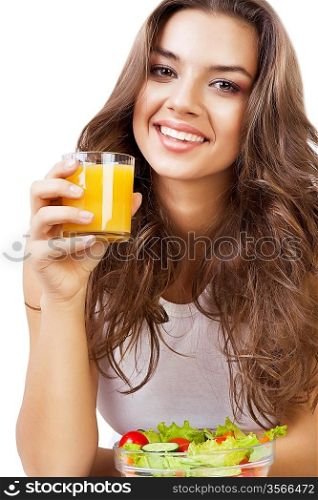cute woman with juice and salad on white background