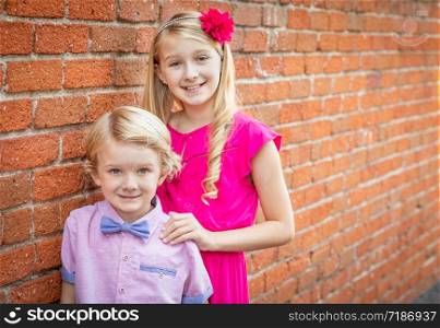 Cute Young Caucasian Brother and Sister Portrait.