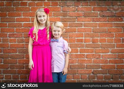 Cute Young Caucasian Brother and Sister Portrait.