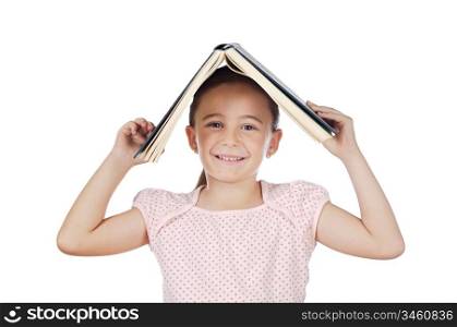 Cute young girl holding book on head