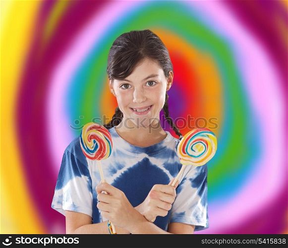 Cute young girl with two lollipops with a colorful background