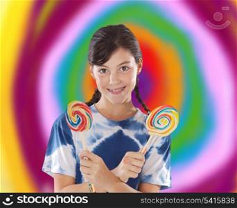 Cute young girl with two lollipops with a colorful background