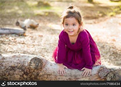 Cute Young Mixed Race Baby Girl Playing Outdoors.