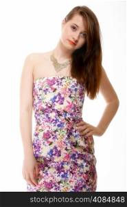 cute young woman in summer flowery dress on white background. Fashion photo.