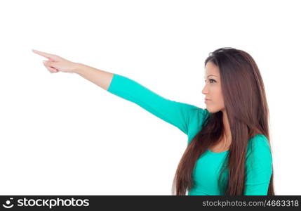 Cute young woman indicating something with the finger isolated on a white background