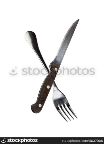 Cutlery in cross isolated on white background