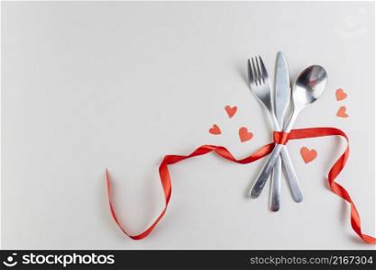 cutlery with paper hearts table