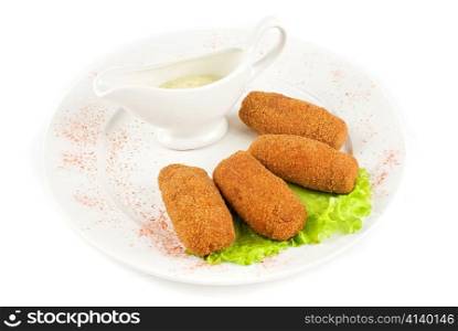 cutlets of meat and lettuce isolated on a white