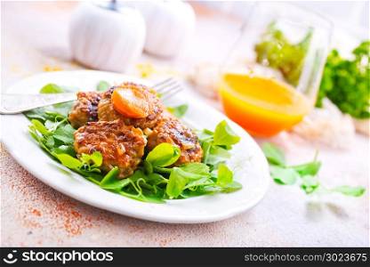 cutlets with sauce and fresh salad, cutlets on white plate