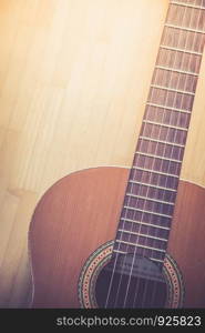 Cutout of a classical guitar corpus and strings, closeup