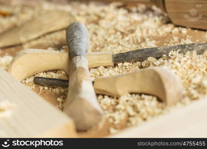 Cutters for wood and wood shavings on table