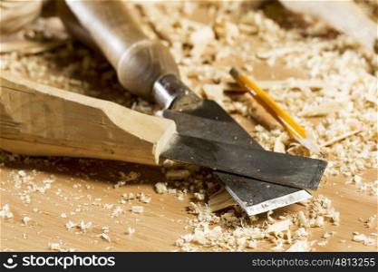 Cutters for wood and wood shavings on table