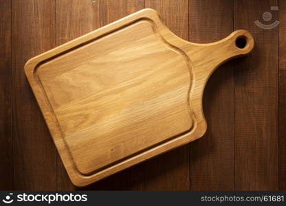 cutting board on wooden background