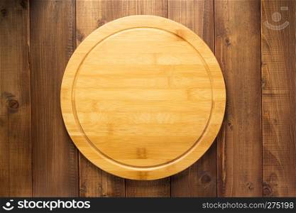 cutting board on wooden background table texture