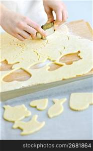 Cutting cookies from dough