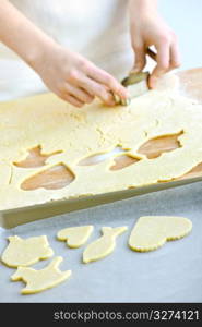 Cutting cookies from dough