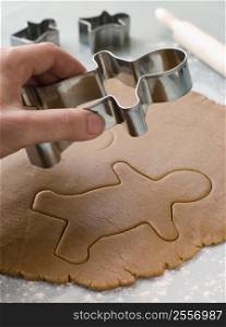 Cutting out a Gingerbread Man