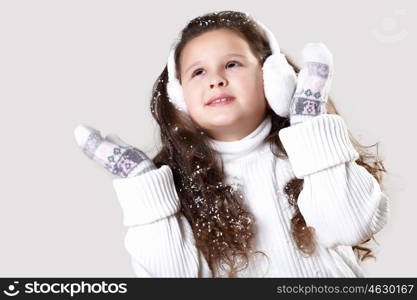 Cuty little girl in winter wear happy about new year