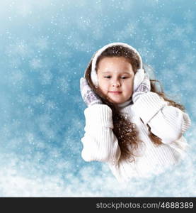 Cuty little girl in winter wear happy about new year