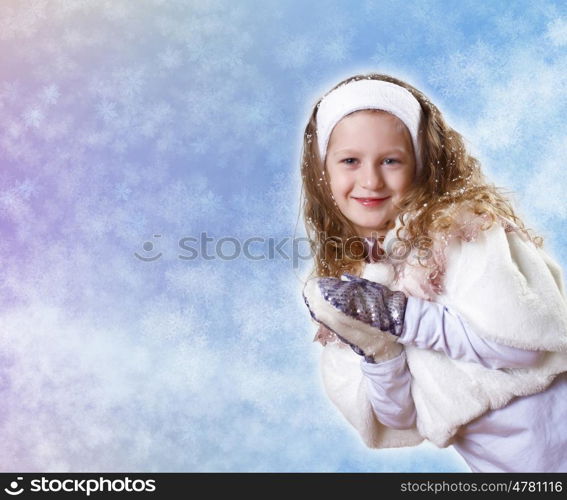 Cuty little girl in winter wear happy about new year