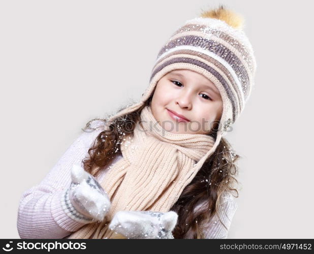 Cuty little girl in winter wear happy about new year