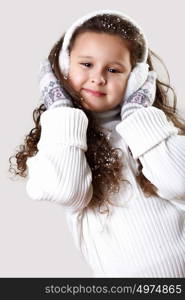 Cuty little girl in winter wear happy about new year