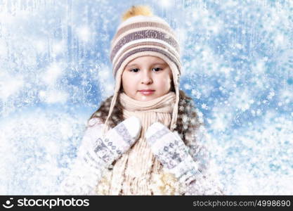 Cuty little girl in winter wear happy about new year