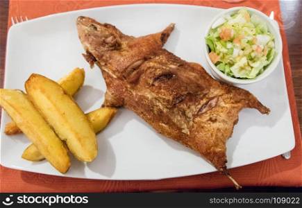 Cuy ( cooked Guinea pig), typical andean dish