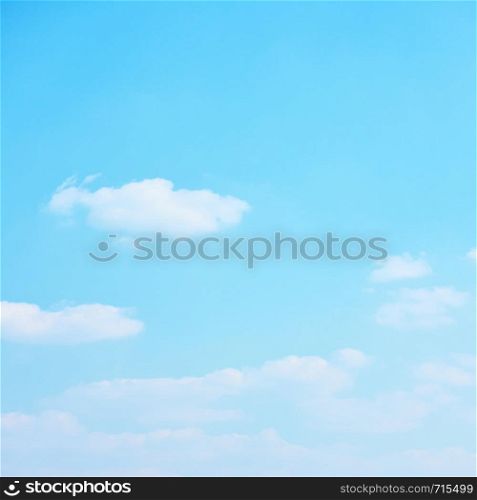 Cyan blue sky with clouds - pastel color background with largre space for your own text