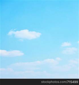 Cyan blue sky with clouds - pastel color background with largre space for your own text