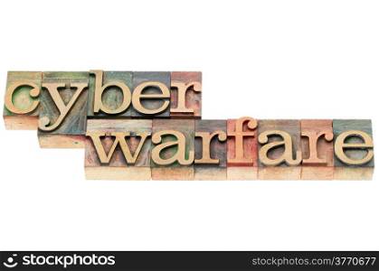 cyber warfare words - isolated text in letterpress wood type stained by color inks