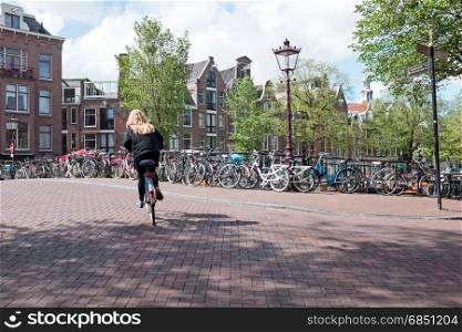 Cycling in the city center from Amsterdam the Netherlands