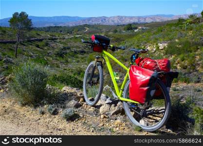 cycling tourism MTB bike in Pedralba Villamarxant Valencia with panniers and saddlebag