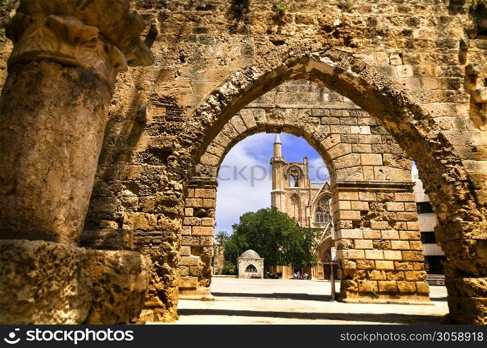Cyprus island travel and landmarks. Stone arch of ancient town Famagusta in Turkish part