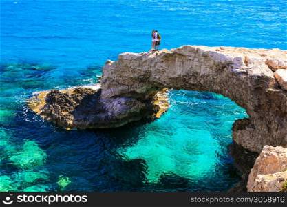 Cyprus island travel and nature landmarks. Stone arch famous as Bridge of Lovers