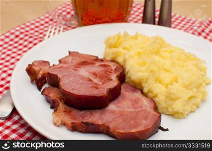 Czech Cuisine - Smoked Pork Meat With Potato PurAe With Beer Served on Table