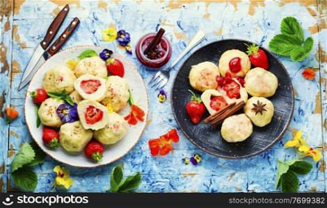 Czech dumplings varenyky with berries.Dumplings with strawberries or knedlik.. Stuffed strawberry dumplings,czech food