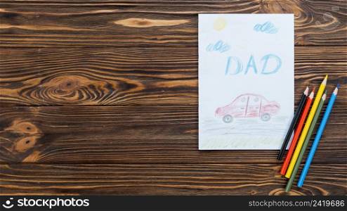 dad inscription with car drawing paper sheet