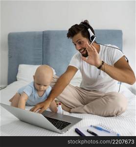 dad working from home during quarantine with child