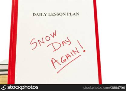 Daily Lesson Plan sheet with handwritten SNOW DAY AGAIN in red letters with school books in background