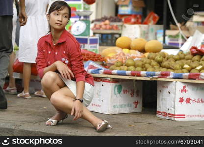 Daily life in China a young model poses for the camera.